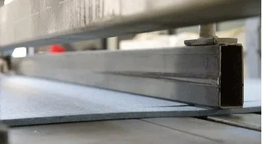 Hot pressing and shaping of PET acoustic panel material