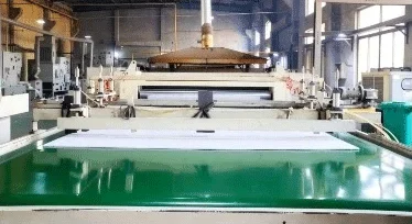 Needle punching and shaping of PET felt acoustic panels